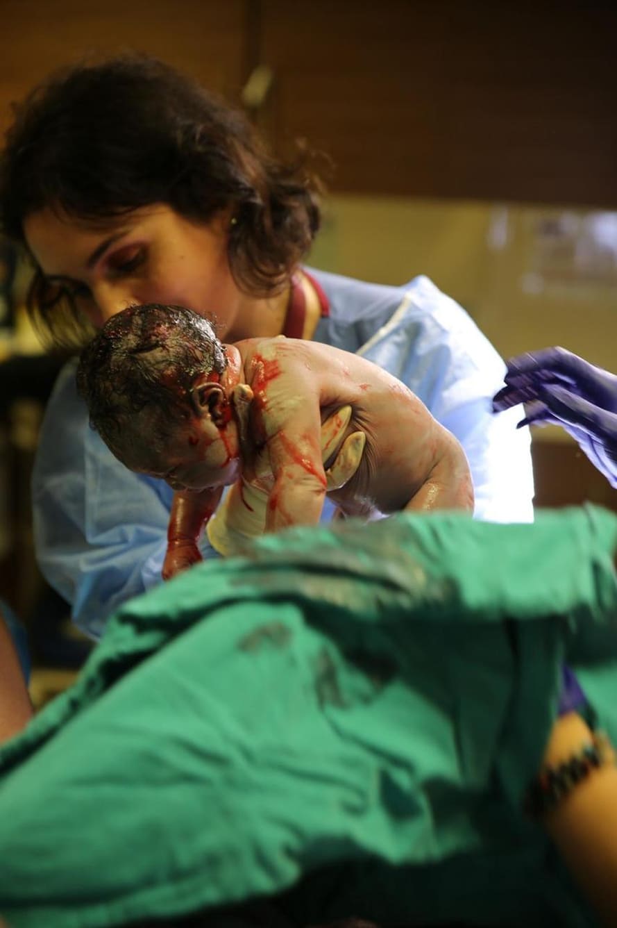 Gynecologist performing minimally invasive procedure